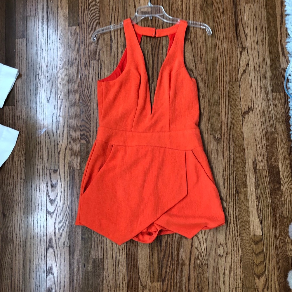 An orange romper